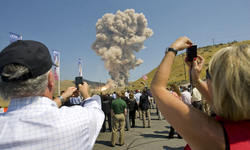 Al Hartmann  |  The Salt Lake Tribune 
Guest and employees of ATK and Nasa gather at  the Promontory facility west of Brigham City Thursday September 8  to watch ATK test fire a DM-3 rocket motor.