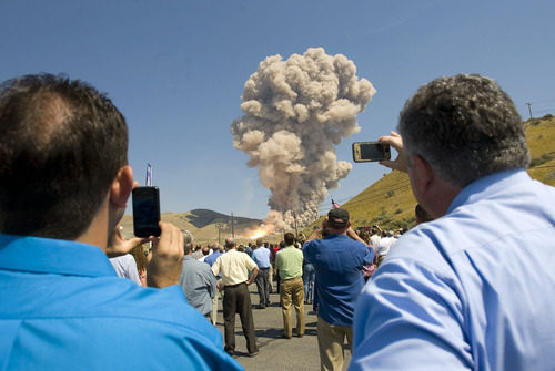 Al Hartmann  |  The Salt Lake Tribune 
Guest and employees of ATK and Nasa gather at  the Promontory facility west of Brigham City Thursday September 8  to watch ATK test fire a DM-3 rocket motor.