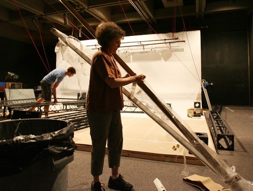 Steve Griffin  |  The Salt Lake Tribune

 Ellen Bromberg, a professor of dance and technology at the University of Utah, works on a truss system that will hang from the ceiling of a new lab she is working on that will help merge the dance and technology disciplines. The lab is being built in the old Museum of Fine Arts building on campus  in  Salt Lake City.