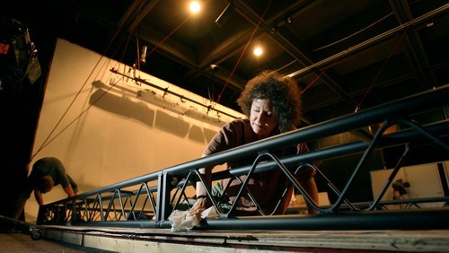 Steve Griffin  |  The Salt Lake Tribune
Ellen Bromberg, a professor of dance and technology at the University of Utah, works on a truss system that will hang from the ceiling of a new lab she is working on that will help merge the dance and technology disciplines. The lab is being built in the old Museum of Fine Arts building on campus  in  Salt Lake City.