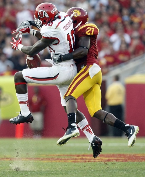 Chris Detrick  |  The Salt Lake Tribune
Utah Utes wide receiver DeVonte Christopher (10) can't make a catch under pressure from USC Trojans cornerback Nickell Robey (21) during the second half of the game at the Los Angeles Memorial Coliseum Saturday September 10, 2011.