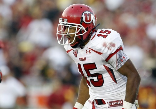 Chris Detrick  |  The Salt Lake Tribune
Utah Utes running back John White IV (15) celebrates after scoring a touchdown during the second half of the game at the Los Angeles Memorial Coliseum Saturday September 10, 2011.