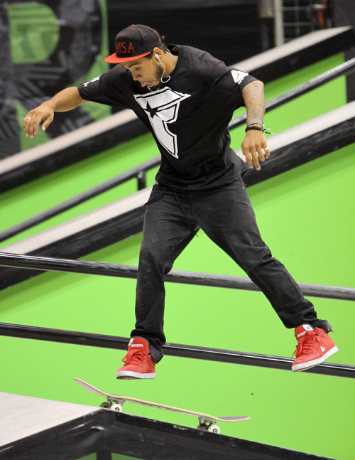 Skater Manny Santiago competes in the Dew Tour skateboard street finals held in the Energy Solutions Arena in Salt Lake City.
Stephen Holt/ Special to the Tribune