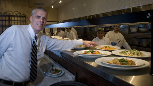Paul Fraughton  |  The Salt Lake Tribune 
Dan Hobbs, the general manager of Brio Tuscan Grille, checks on some sample entrees from the kitchen.