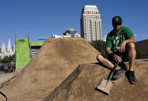 Djamila Grossman  |  The Salt Lake Tribune

BMX rider TJ Lavin helps set up the dirt jumps for this year's Dew Tour in downtown Salt Lake City.  He poses for a portrait on one of the jumps, on Sunday, Sept. 4, 2011. Lavin fell last year and was injured while competing.