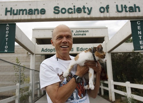 Trent Nelson  |  The Salt Lake Tribune
Patrick Wiggins inherited $46,000 from his ex-wife. Instead of keeping the money, he donated it to the Utah Humane Society, because they were both animal lovers. He was photographed with his pet cat Pumpkin, at the Humane Society in Murray, Utah, Friday, September 9, 2011.