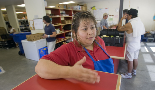 Al Hartmann  |  The Salt Lake Tribune

Lydia Herrera, director of the  Hildegard's Food Pantry at 231 East 100 South in Salt Lake City, has noticed an increase in food needs for the poor.  She has a harder time keeping the pantry's shelves stacked.