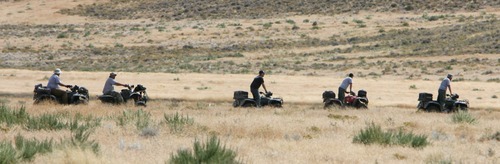 Steve Griffin  |  The Salt Lake Tribune
Authorities on ATVs on Wednesday search the area around Topaz Mountain in Juab County for Susan Powell.