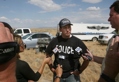 Steve Griffin  |  The Salt Lake Tribune

West Valley City police Lt. Bill Merritt informs the media that cadaver dogs found human remains while searching for Susan Powell  in the area around Topaz Mountain in Juab County about 40 miles north west of Delta, Utah Wednesday, September 14, 2011.  Several of the cadaver dogs indicated the presence of human remains. Merritt did give any other information about the remains.