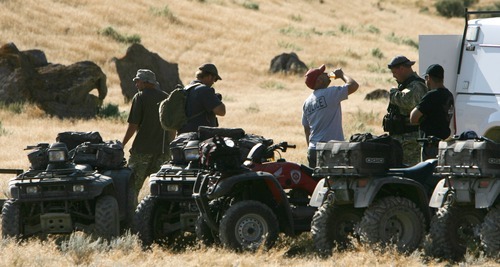 Steve Griffin  |  The Salt Lake Tribune

ATV searches prepare to load up continue the search for Susan Powell in the area around Topaz Mountain in Juab County about 40 miles north west of Delta, Utah Thursday, September 15, 2011.