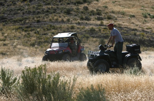 Steve Griffin  |  The Salt Lake Tribune

ATV searches head out of the command area continue the search for Susan Powell in the area around Topaz Mountain in Juab County about 40 miles north west of Delta, Utah Thursday, September 15, 2011.