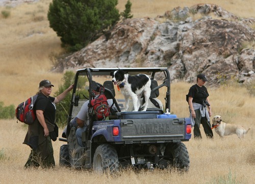 Steve Griffin  |  The Salt Lake Tribune
Authorities use dogs and by ATVs in the search for signs of Susan Powell in the area around Topaz Mountain in Juab County near Delta on Wednesday.