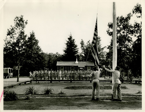 Salt Lake Tribune file photo

This undated photo shows a flag raising ceremony at Civilian Conservation Corps camp.