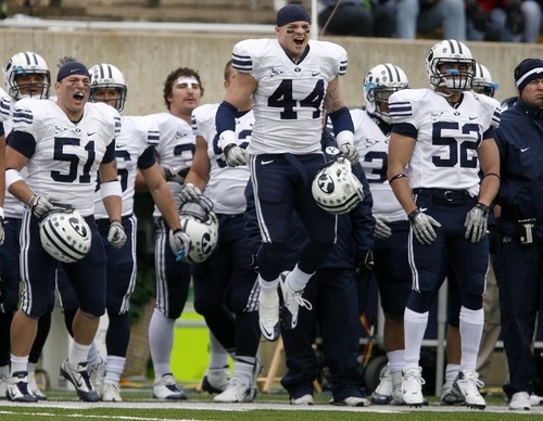 Trent Nelson  |  The Salt Lake Tribune
BYU linebacker Brandon Ogletree (44) leaps on the sideline, celebrating a second half play. BYU vs. Colorado State, college football, Saturday, November 13, 2010. BYU won 49-10.