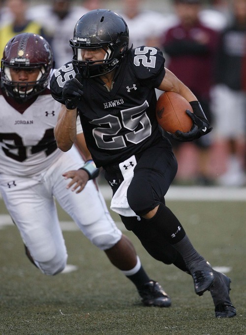 Trent Nelson  |  The Salt Lake Tribune
Alta's Bryan Engstrom runs the ball. Alta vs. Jordan High School football in Sandy, Utah, on Friday, September 16, 2011.