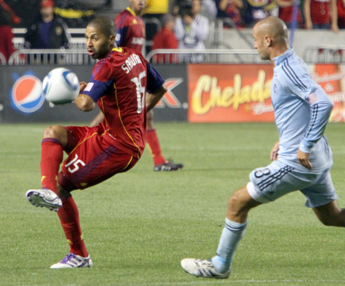 Real Salt Lake forward Alvaro Saborio sends the ball for a fast break against Sporting Kansas City during their1-0 home win in Rio Tinto Stadium.
Stephen Holt/ Special to the Tribune