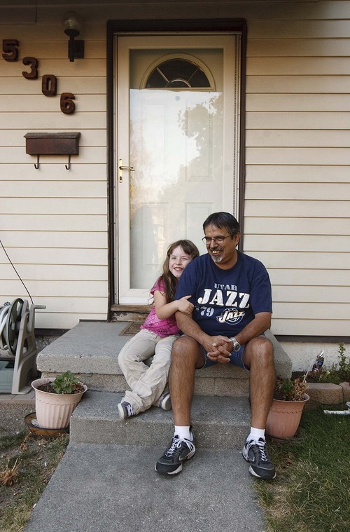 Trent Nelson  |  The Salt Lake Tribune
Lee Martinez with his granddaughter Vanessa Thompson on their front porch in Kearns. Census figures show that there has been a 50 percent increase in households with three generations living together. Much of the incentive is financial, although cultural traditions also play a role.