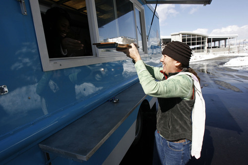 Francisco Kjolseth  |  The Salt Lake Tribune
Julie Sheehan, owner of the Torta Truck, opens up shop in the Cottonwood Heights area on Tuesday, March 8, 2011. On Sunday, Sheehan will be featured in the annual 