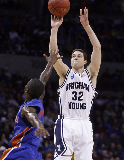 Jim Urquhart  |  The Salt Lake Tribune
BYU's Jimmer Fredette puts a shot up over Florida's Kenny Boynton on March 18, 2010, at the Ford Center in Oklahoma City. Fredette is a prospect for the 2011 NBA Draft.