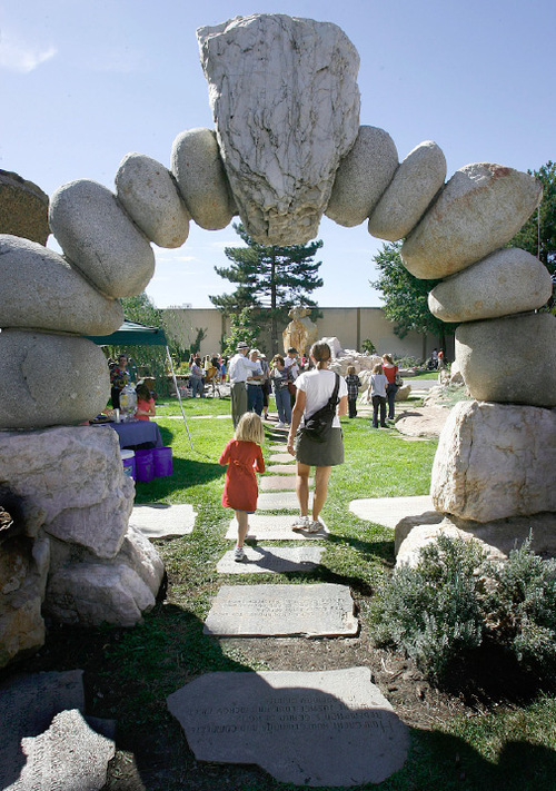 Scott Sommerdorf  l  The Salt Lake Tribune
Visitors to the Gilgal Sculpture Garden pass through a stone gate made by artist Thomas B. Child. In 2010, the garden celebrated its 10th anniversary as a Salt Lake City public park.