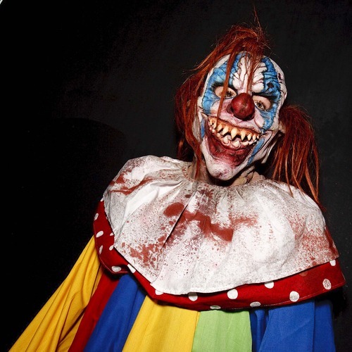 Trent Nelson  |  The Salt Lake Tribune
An evil clown at the Strangling Brothers Haunted Circus in Draper, Utah, Friday, September 16, 2011. Strangling Brothers has 23 custom designed tractor-trailers, each with a different experience and innovative lighting and sound environments.