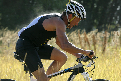 Scott Sommerdorf  |  The Salt Lake Tribune             
Steam rises from Lance Armstrong as he rides during the second leg of the 2011 XTERRA Nationals held at Snowbasin, Saturday, September 24, 2011. Armstrong finished fifth with a time of 2:29.25.