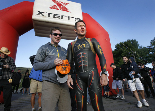 Scott Sommerdorf  |  The Salt Lake Tribune             
Lance Armstrong looks out at Pineview Reservoir prior to the start of the 2011 XTERRA Nationals held at Snowbasin, Saturday, September 24, 2011. Armstrong finished fifth with a time of 2:29.25.