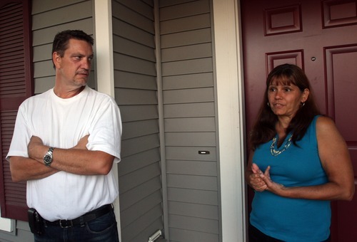 Rick Egan  | The Salt Lake Tribune 
Joe Higginson, left, and his wife Vicki, talk Friday about the arrest of her neighbor, Steve Powell, in Puyallup Wash. 