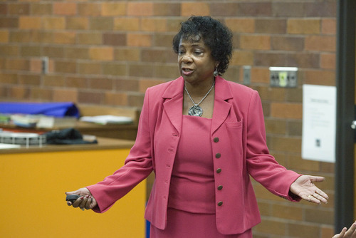 Paul Fraughton  |  The Salt Lake Tribune 
Joyce Gray gives third-grader Karla Vargas a high-five after speaking at Horizon Elementary School in Murray. Gray is one of hundreds of African-American 