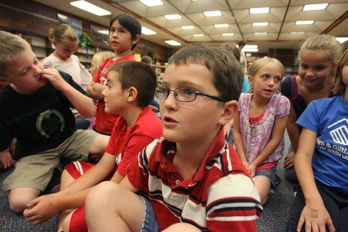 Paul Fraughton  |  The Salt Lake Tribune 
Third-grader Stanford Zito talks about what he learned from Joyce Gray's presentation at Horizon Elementary School in Murray. Gray is one of hundreds of African-American 