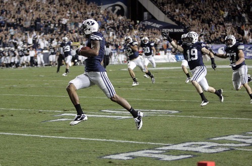 Trent Nelson  |  The Salt Lake Tribune
BYU's Cody Hoffman scores a touchdown on a kick return in the third quarter. BYU vs. Central Florida, college football at LaVell Edwards Stadium in Provo, Utah, Friday, September 23, 2011.