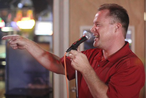 Lennie Mahler  |  The Salt Lake Tribune
Dan Pearson sings at the Highlander Club karaoke bar, 6194 South and Highland Drive, on Aug. 26. The bar features nightly karaoke with two practice booths and a 65,000-song catalog.
