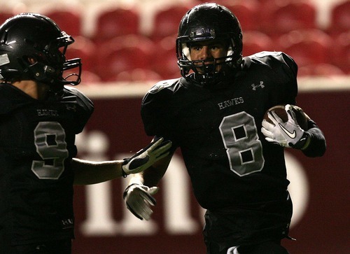 Leah Hogsten | The Salt Lake Tribune
Alta's Steven Miller catches the interception from Taft for a 40yard touchdown. Alta High School played Taft High School Saturday, September 24 2011 at Rio Tinto Stadium.