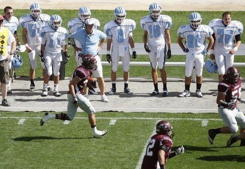 Chris Detrick  |  The Salt Lake Tribune
Jordan's Austin Grant (34) runs the ball during the game at Rio Tinto Stadium Saturday September 24, 2011. Jordan won the game 39-0.
