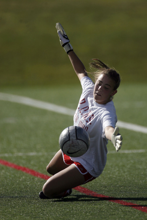 Francisco Kjolseth  |  The Salt Lake Tribune
Goalkeepr Skye Mooney of Park City blocks shots as she practices with the team on the soccer fields next to the Park City Ice Arena on Monday. Park City started Region play 4-0 and is vying for a league title with two weeks remaining.