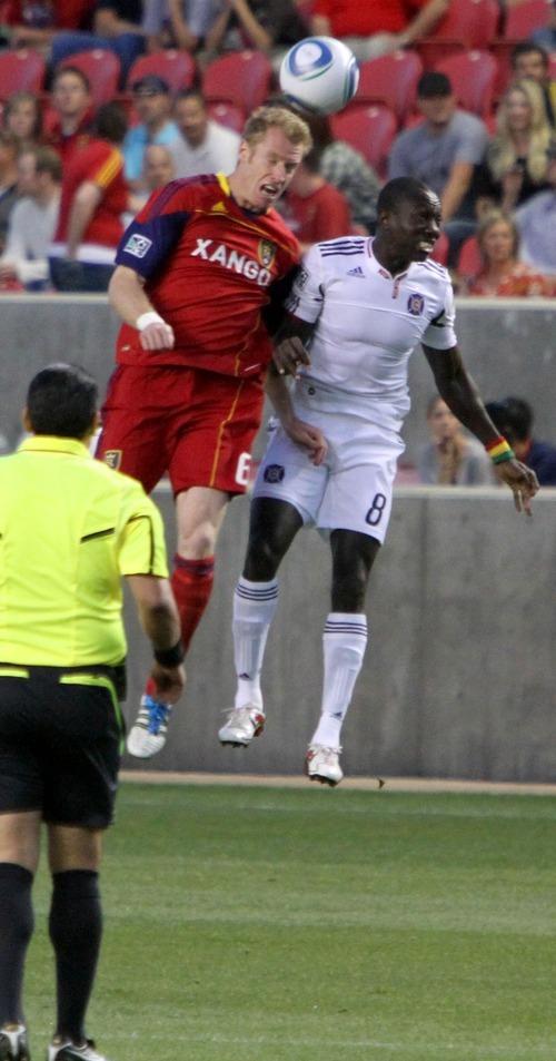 Real Salt Lake defender Nat Borchers out jumps Chicago fire forward Dominic Oduro in the first half in Rio Tinto Stadium.
Stephen Holt/ Special to the Tribune