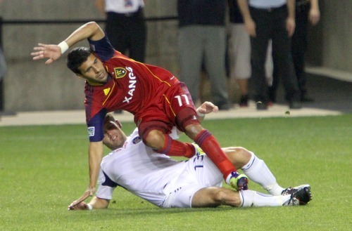 Real Salt Lake midfielder Javier Morales is tripped up by defender Gonzalo Segares during RSL's 0-3 home loss in Rio Tinto Stadium.
Stephen Holt/ Special to the Tribune