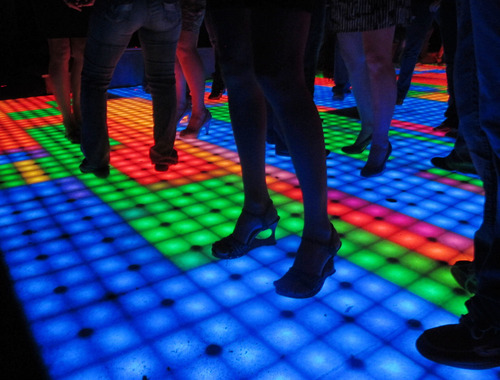 Keith Johnson | The Salt Lake Tribune
People dance on the colorful lighted dance floor at Club Allure in Sandy. The club uses Facebook, MySpace and Twitter to connect with and grow its customer base.