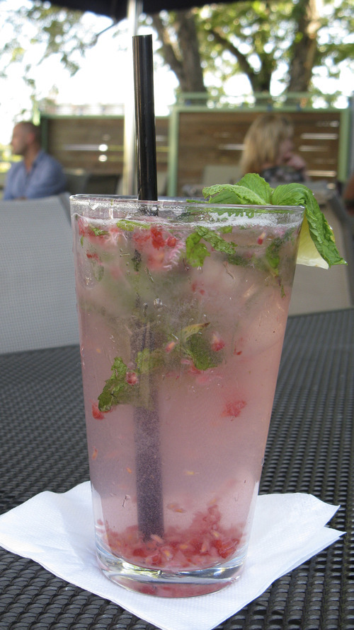 Lesli J. Neilson  |  The Salt Lake Tribune 
A Raspberry Mojito ($7.50) at Gracie's is a blend of mint, raspberries and baker's (superfine) sugar that's muddled and served in an iced pint glass with Cruzan Raspberry Rum, soda water and  lime wedge and mint garnishes.