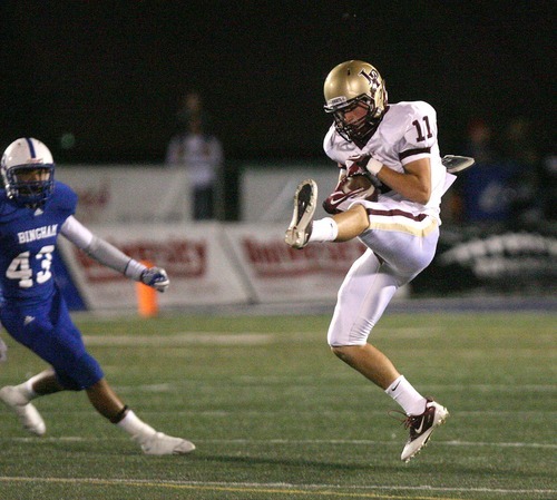 Paul Fraughton  |  The Salt Lake Tribune 
Lone Peak's Zac Saunders is wide open  as he catches the pass for a long gain. The Bingham High Miners played Lone Peak High School at Bingham
  Thursday, September 29, 2011