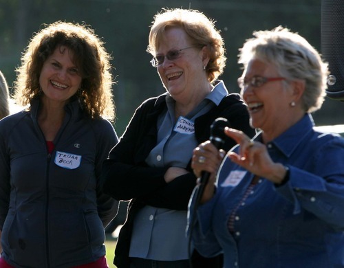 Leah Hogsten | The Salt Lake Tribune
Utah Democrat supporters, from left, former Rep.Trisha Beck, and Granite School Board member Connie Anderson share a laugh with Rep. Carol Spackman Moss at the Utah State Democratic Party's LDS Dems Kick-off pancake breakfast on Saturday in Murray Park.