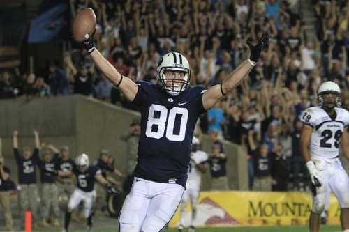 Rick Egan  | The Salt Lake Tribune 

Brigham Young Cougars tight end Marcus Mathews (80) celebrates the winning touchdown as BYU  defeated Utah State, 27-24 on this touchdown pass with 11 seconds left in the game,  in Provo, Friday, September 30, 2011.