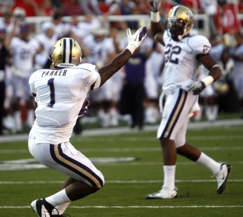 Rick Egan  | The Salt Lake Tribune 

Washington Huskies safety Sean Parker (1) celebrates his fumble recovery near the goal line along with Washington Huskies defensive end Josh Shirley (22), in Pac-12 action, Utah vs. University of Washington, at Rice-Eccles stadium, Saturday, October 1, 2011.