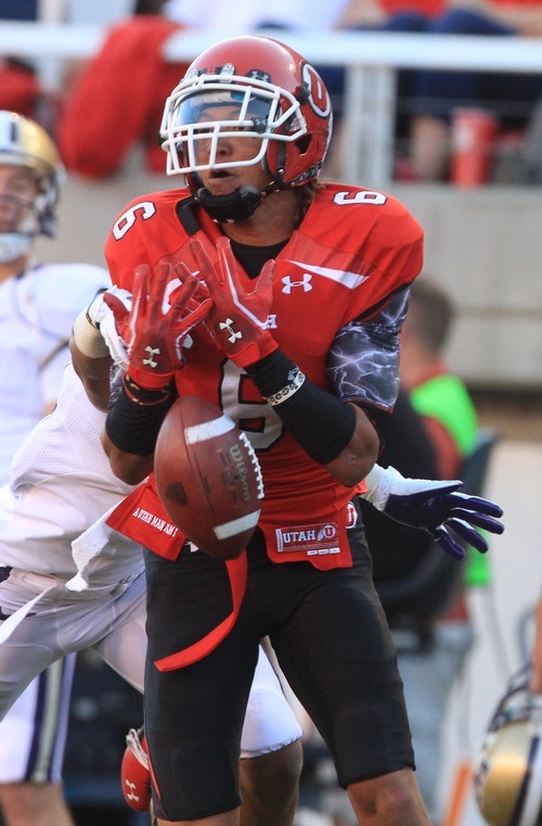 Rick Egan  | The Salt Lake Tribune 

Utah Ute's wide receiver Dres Anderson (6) cant quite hold on to the ball, as the pass drops between his arms, in Pac-12 action, Utah vs. University of Washington, at Rice-Eccles stadium, Saturday, October 1, 2011.