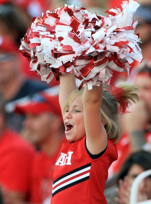 Rick Egan  | The Salt Lake Tribune 

Anaelise Fisher, 8, cheeers on the Utes  in Pac-12 action, Utah vs. University of Washington, at Rice-Eccles stadium, Saturday, October 1, 2011.