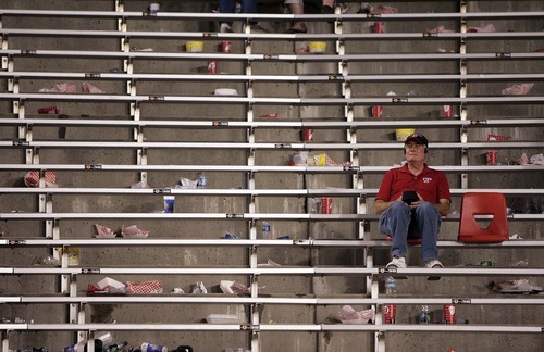 Trent Nelson  |  The Salt Lake Tribune
A Utah fan in his seat after the loss. Many fans left before the game ended at Rice-Eccles Stadium in Salt Lake City on Saturday.