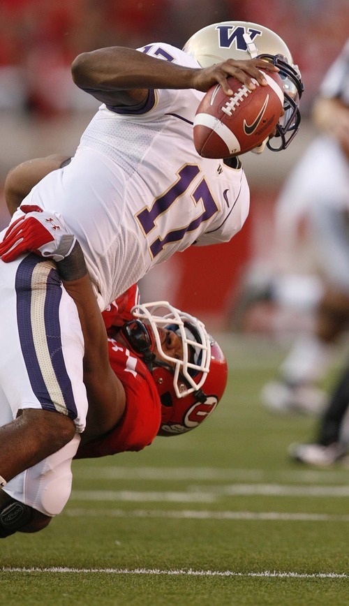 Trent Nelson  |  The Salt Lake Tribune
Utah's Derrick Shelby brings down Washington quarterback Keith Price during the second quarter. Utah vs. Washington, college football at Rice-Eccles Stadium in Salt Lake City, Utah, Saturday, October 1, 2011.