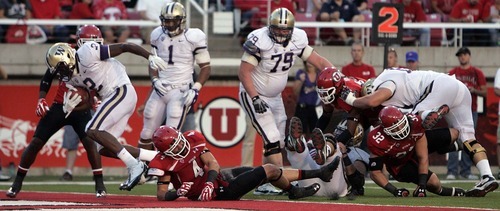 Trent Nelson  |  The Salt Lake Tribune
Washington's Kasen Williams, left, scores a second half touchdown. Utah vs. Washington, college football at Rice-Eccles Stadium in Salt Lake City, Utah, Saturday, October 1, 2011.