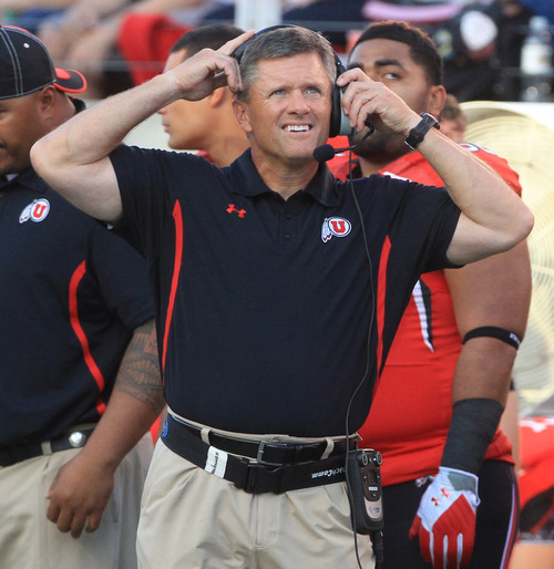 Rick Egan  | The Salt Lake Tribune 

Ute's head coach Kyle Whittingham checks out the clock, in Pac-12 action, Utah vs. University of Washington, at Rice-Eccles stadium, Saturday, October 1, 2011.