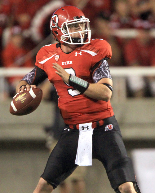 Rick Egan  | The Salt Lake Tribune 

 Utah Utes quarterback Jon Hays (9) throws down field, in Pac-12 action, Utah vs. University of Washington, at Rice-Eccles stadium, Saturday, October 1, 2011.